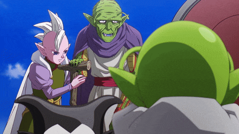 a couple of cartoon characters standing next to each other with a green object in the middle