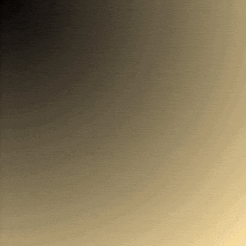 a black and gold gradient background with a slight grainy texture .