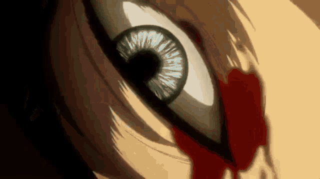 a close up of a person 's eye with blood dripping out of it .