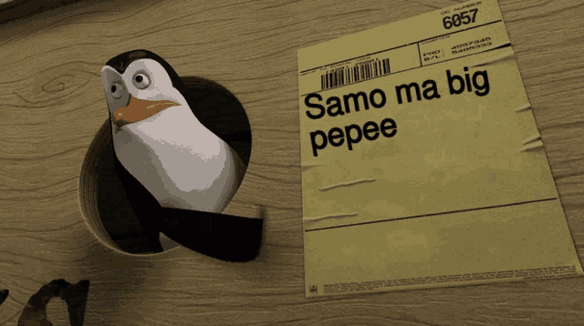 a penguin is sticking its head out of a hole next to a paper that says samo ma big pepee