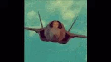 a fighter jet is flying through a blue sky with clouds