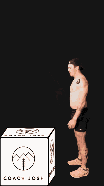 a shirtless man squatting next to a box that says coach josh