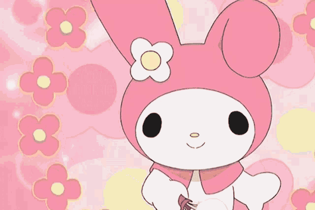 a pink bunny with a white flower on its head holds a whisk