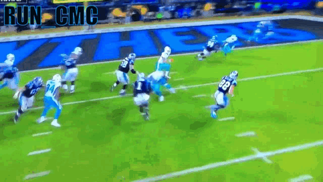 a group of football players are running on a field with the words run cmc written above them