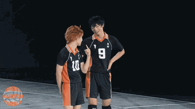 two volleyball players one with the number 10 on his jersey