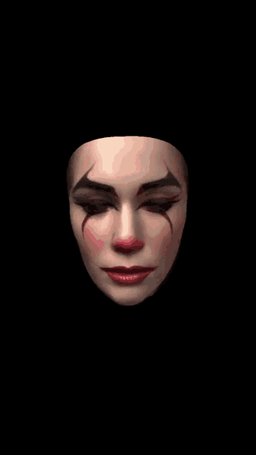 a close up of a clown 's face with its mouth open