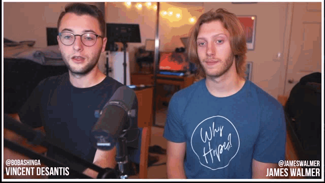 a man wearing a blue shirt that says " why hyped "