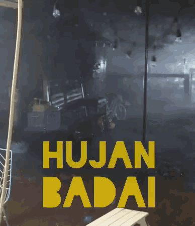 a sign that says hujan badai in yellow