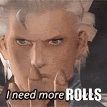 a man with horns is making a funny face and says `` i need more rolls '' .