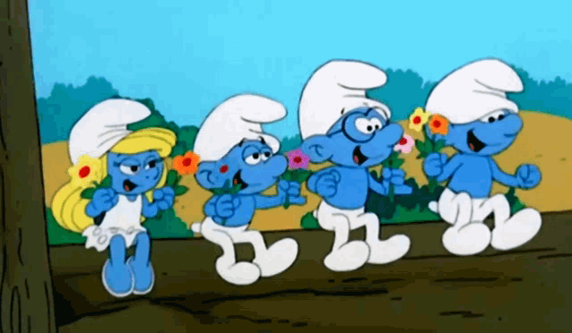 four smurfs are standing next to each other with flowers in their hands
