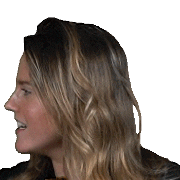 a close up of a woman 's face with long blonde hair