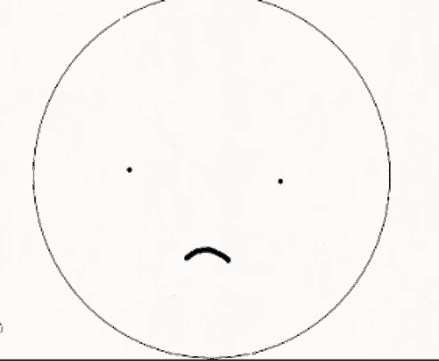 a black and white drawing of a circle with a smiley face drawn on it .