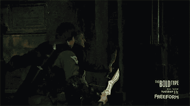 a group of men are fighting with swords in a room with the bold type written on the bottom right