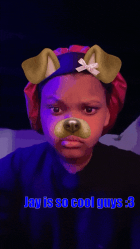 a girl wearing a dog face mask says jay is so cool guys : 3
