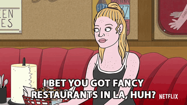 a cartoon of a woman sitting on a red couch with the words " bet you got fancy restaurants in la huh netflix "