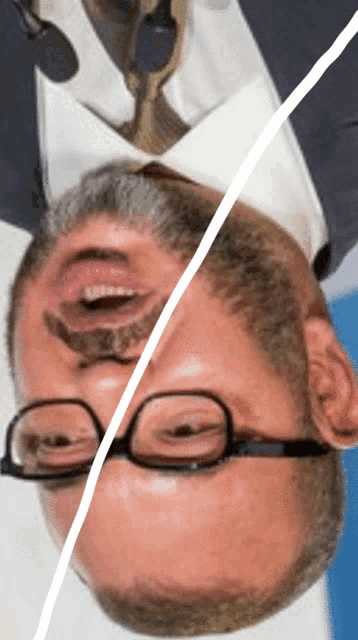 a man with glasses and a microphone on his head