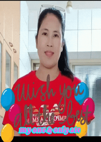 a woman is wearing a red shirt that says wish you a very best