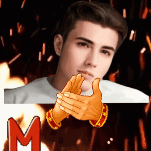 a man clapping his hands in front of a fire with the letter m below him