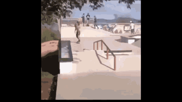 a skateboarder is doing a trick on a railing at a skate park