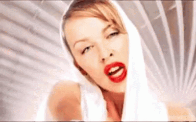 Kylie Minogue Singing GIF - Kylie Minogue Singing Music Video GIFs