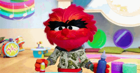 a cartoon character with red hair is holding a bottle of liquid