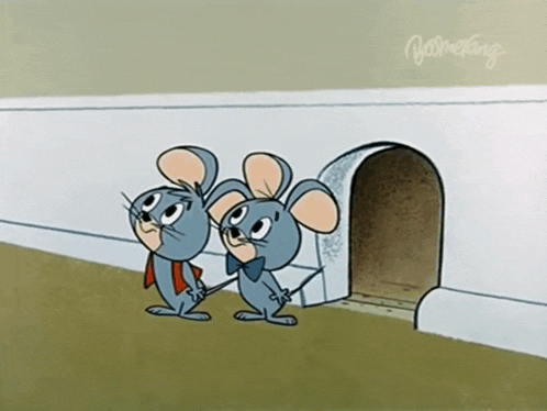 two cartoon mice are standing next to each other in front of a mouse hole and the word gamefang is on the bottom right