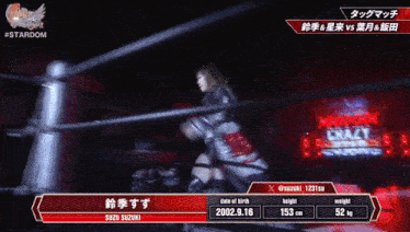 a woman in a wrestling ring with a sign that says crazy