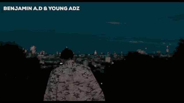 a man in a camo jacket stands in front of a city skyline with the words benjamin a.d & young adz above him