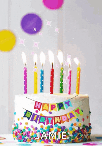 a birthday cake with candles and confetti and the name jamie on it