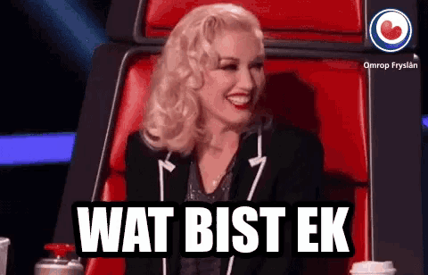 a blonde woman is sitting in a red chair with the words wat bist ek written on it