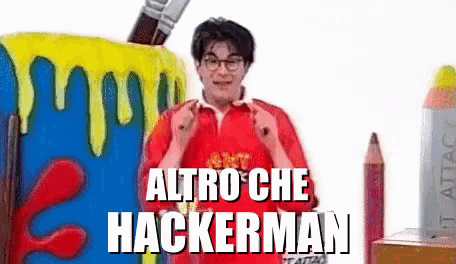 a man in a red shirt is standing in front of a giant paint brush with the words altro che hackerman written on it