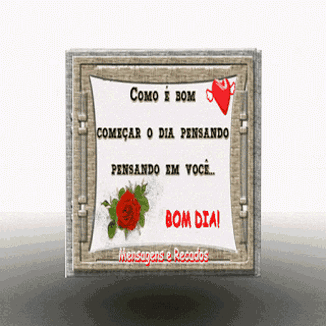 a sign that says bom dia with a red rose on it
