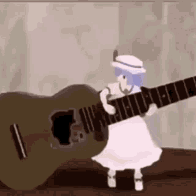 Monita China Tocando Guitarra GIF - Monita China Tocando Guitarra GIFs