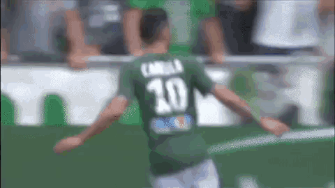 a soccer player with the number 10 on his jersey