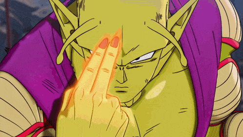 a close up of a cartoon character 's face with his fingers on his forehead