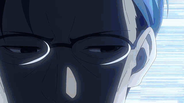 a close up of a person 's face with glasses