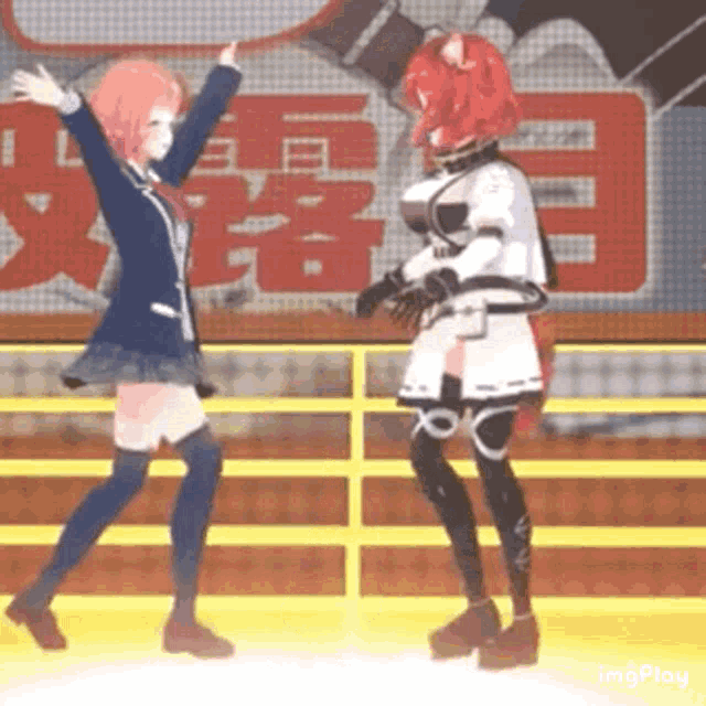 two anime girls are dancing on a stage with chinese characters in the background .
