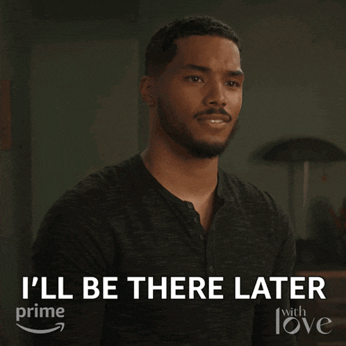 a man in a black shirt says " i 'll be there later " on a screen