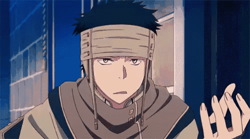 a man with a bandage on his head and a scarf around his neck