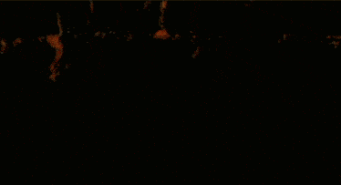 a silhouette of a person in a dark room with a gold background
