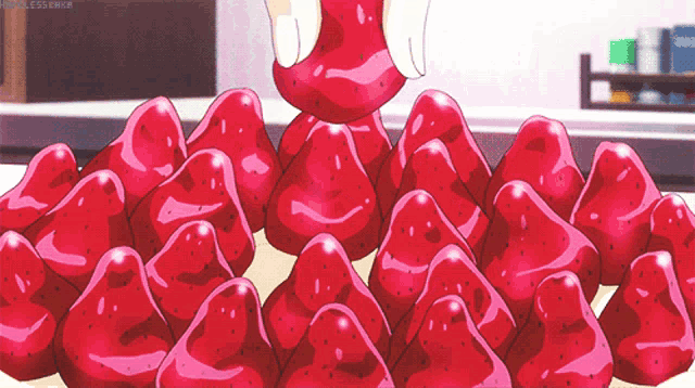 a bunch of strawberries are stacked on top of each other with a watermark that says strawberry legs