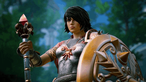 a woman in armor is holding a shield and a spear