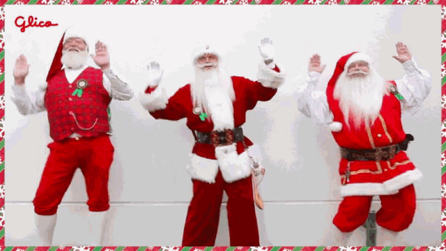 three men dressed as santa claus are posing for a glico ad