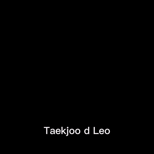 a close up of a man in a suit and tie with the words taekjoo d leo written on it .