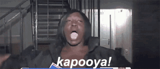a woman is making a funny face with the word kapooya behind her