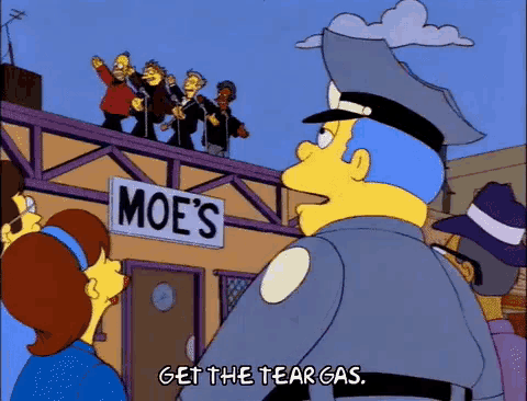 moe 's restaurant has a sign that says get the tear gas on it