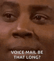 a close up of a man 's face and the words `` voice mail be that long ? ''