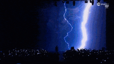 a lightning strike on a stage with tnt sports 1