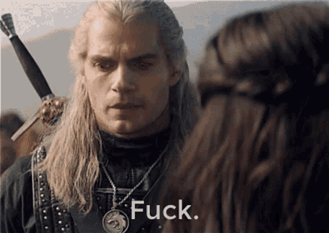 a man with a sword is talking to a woman with the word fuck on the bottom