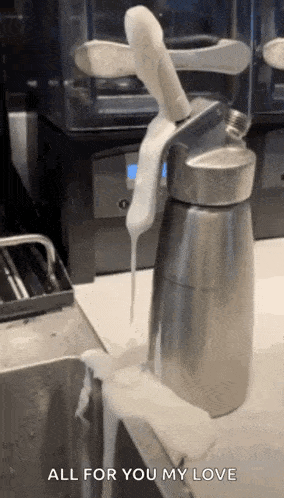 a whipped cream dispenser with a knife sticking out of it and the words all for you my love